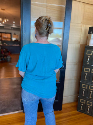 TURQUOISE CREPE TEXTURED V-NECK BLOUSE