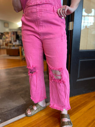 pink distressed overalls 